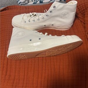 Converse Classic High-Tops in Off-White
DEVIN BOOKER